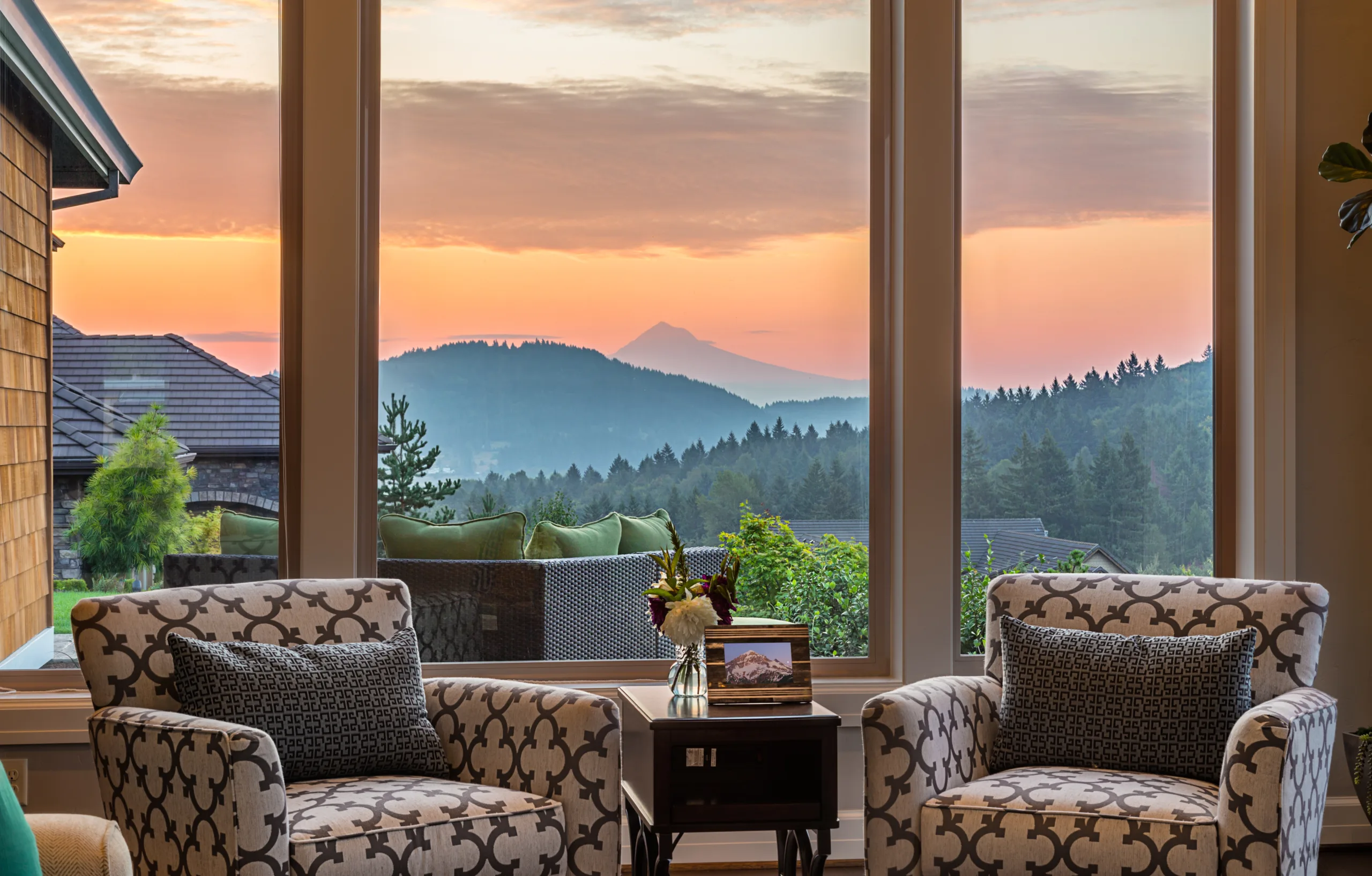 Beautiful Living Room with picture window displaying a Sunrise View.