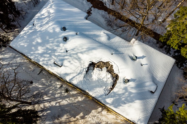 Load of the roof due to the snow collapsed the roof.